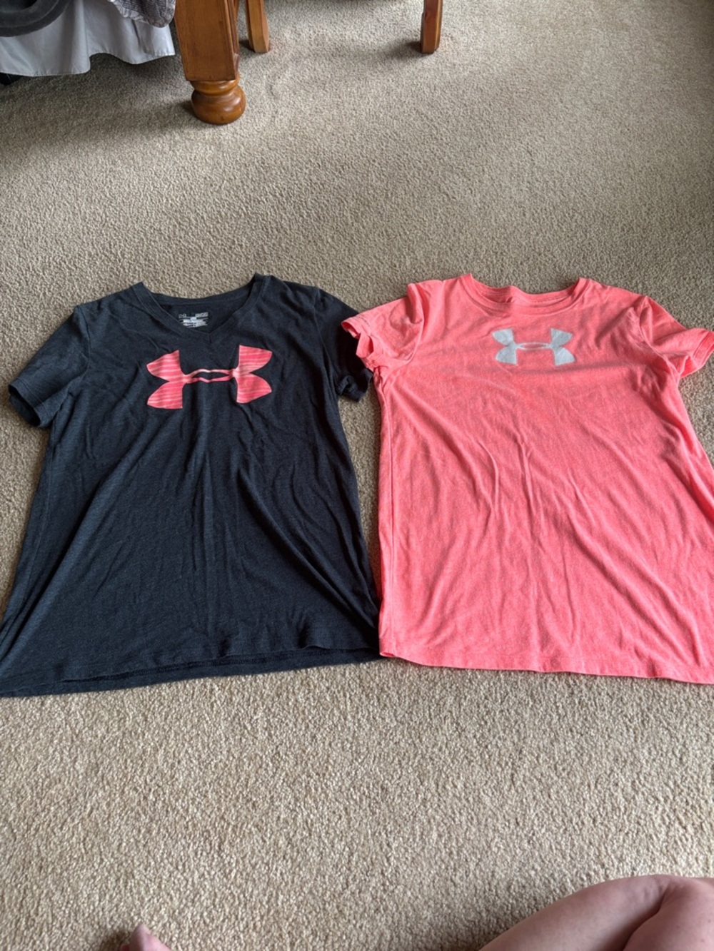 Under Armour women’s Short Sleeve Tees in Black and Coral Pink